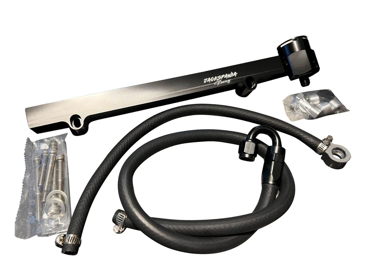 Billet aluminum high flow fuel rail upgrade kit for VW Audi 1.8T Golf A4 engine, by Jack Spania Racing, showing the fuel rail components.