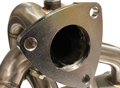 Jack Spania Racing Polaris Slingshot Ramhorn Race Exhaust Manifold with turbo and muffler, showing detailed metal components.