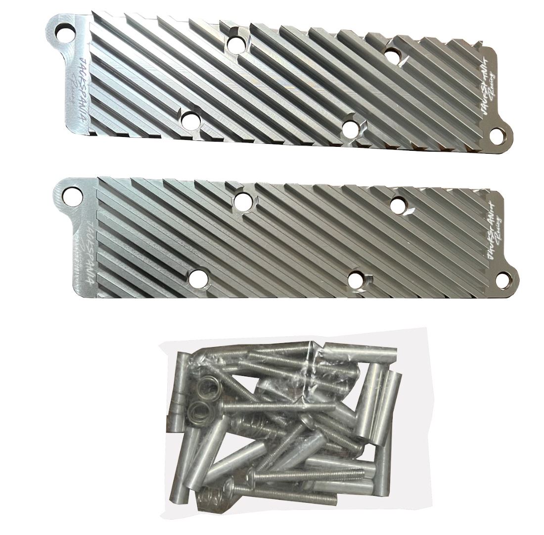 Jack Spania Racing 2.7T Conversion Coil Pack Hold Down Bracket Kit for Audi engine parts, shown mounted on engine assembly.