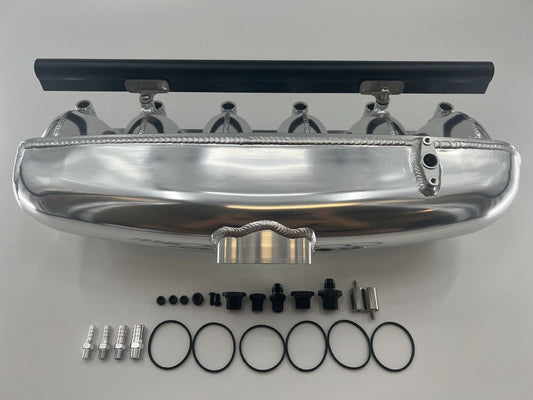 Center feed intake manifold fuel rail for BMW N54 engine, compatible with 135i, 335i, 535i E90, by Jack Spania Racing.
