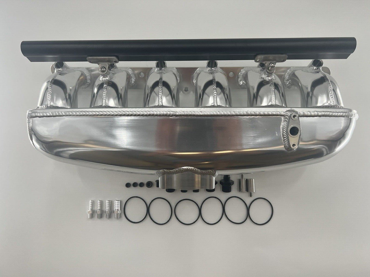 Center feed intake manifold fuel rail for BMW N54 engine, compatible with 135i, 335i, 535i E90 by Jack Spania Racing.