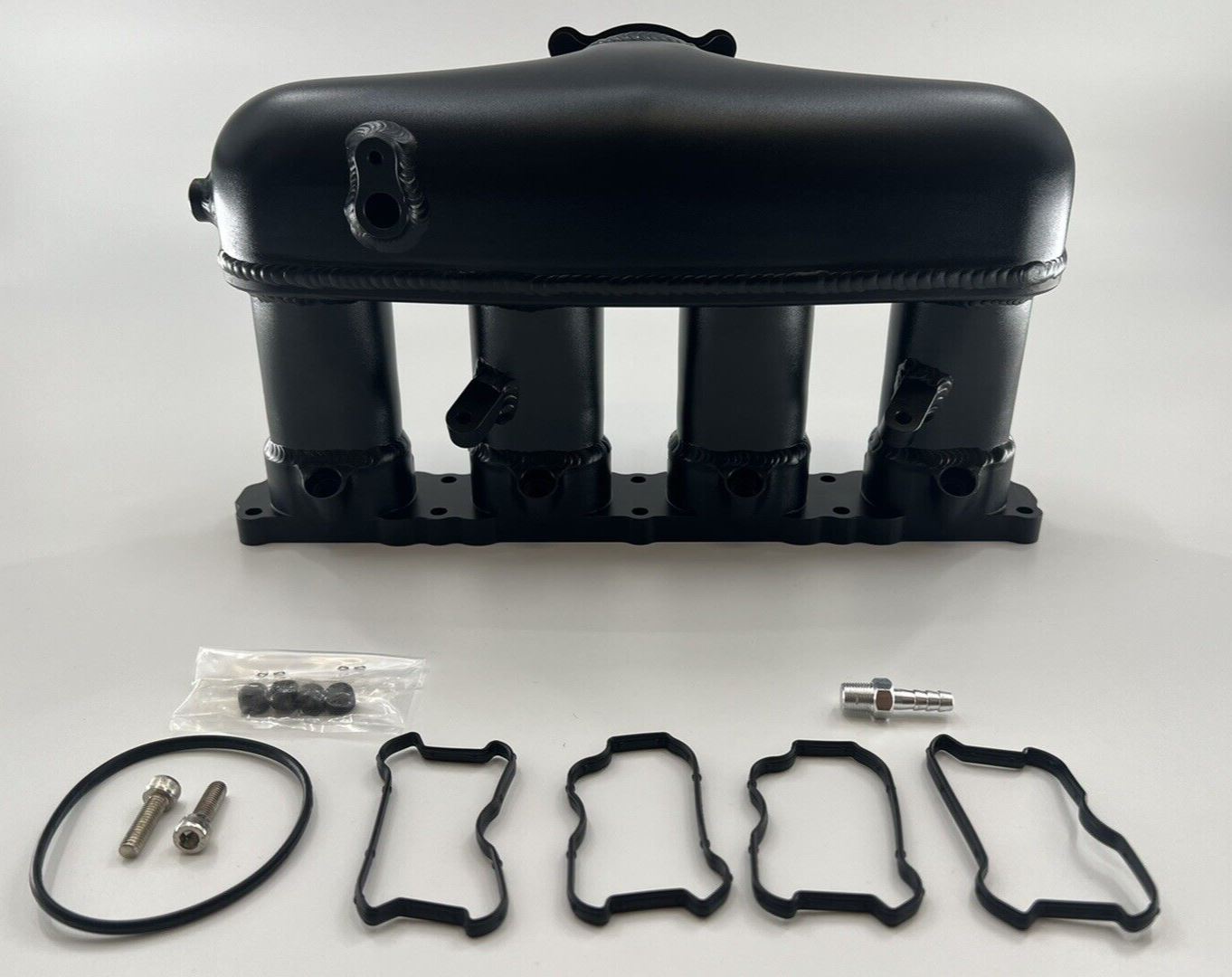 Engine intake manifold for VW Audi 1.8T and 2.0T, EA888 Gen 3, by Jack Spania Racing, showing the metal component with inlet ports.