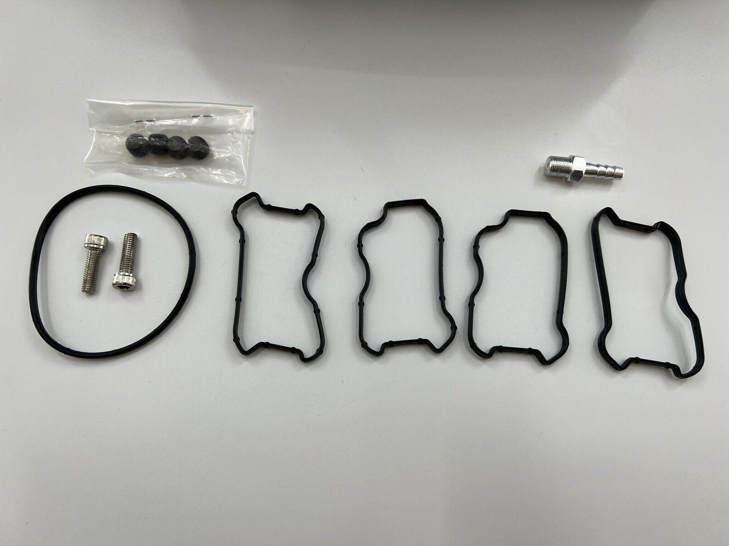 Jack Spania Racing intake manifold for VW Audi EA888 Gen 3 1.8T 2.0T engine, with visible metal construction and brand logo.