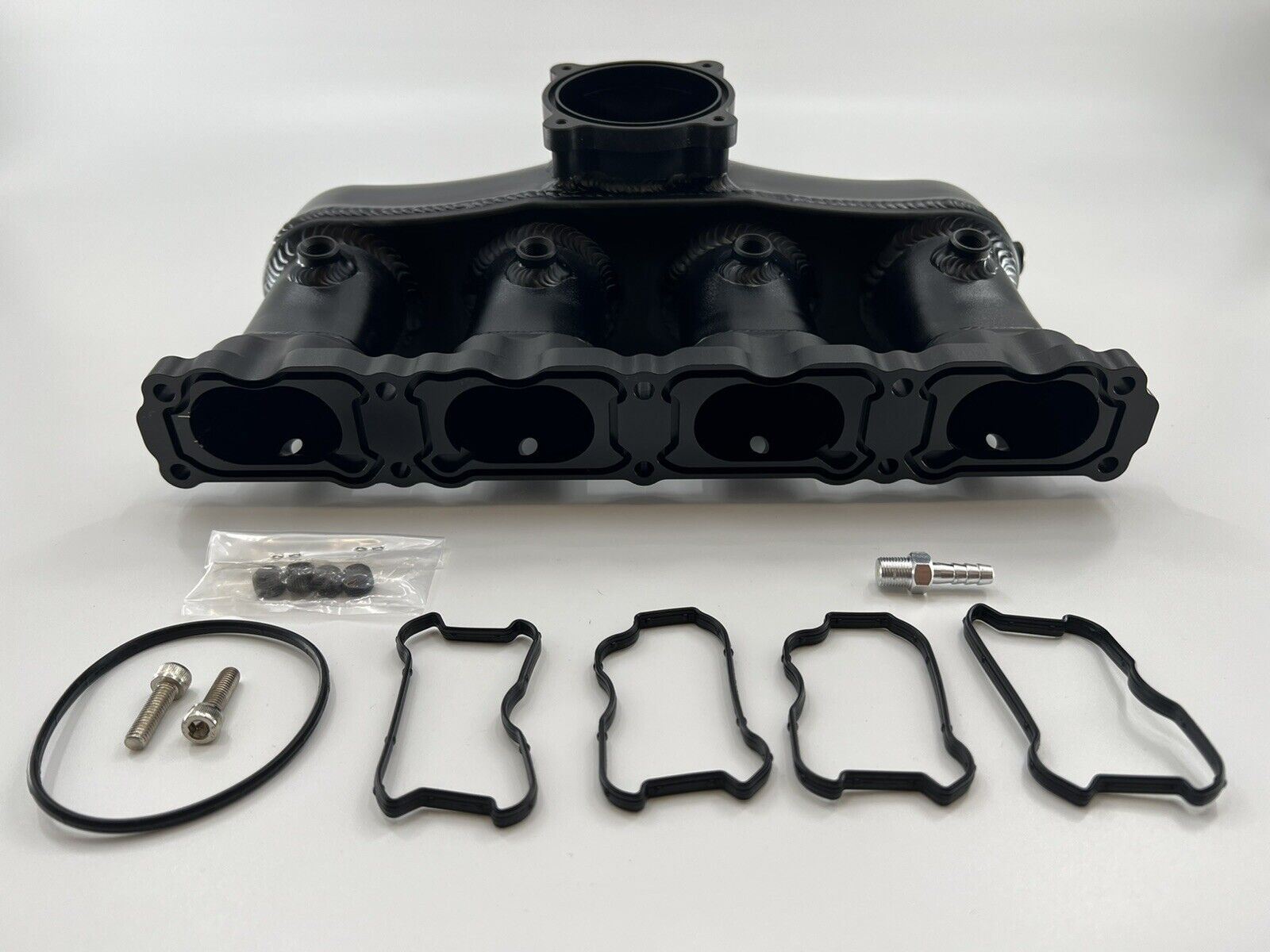 Jack Spania Racing intake manifold for VW Audi EA888 Gen 3 1.8T 2.0T engine parts, showing the polished metal design.