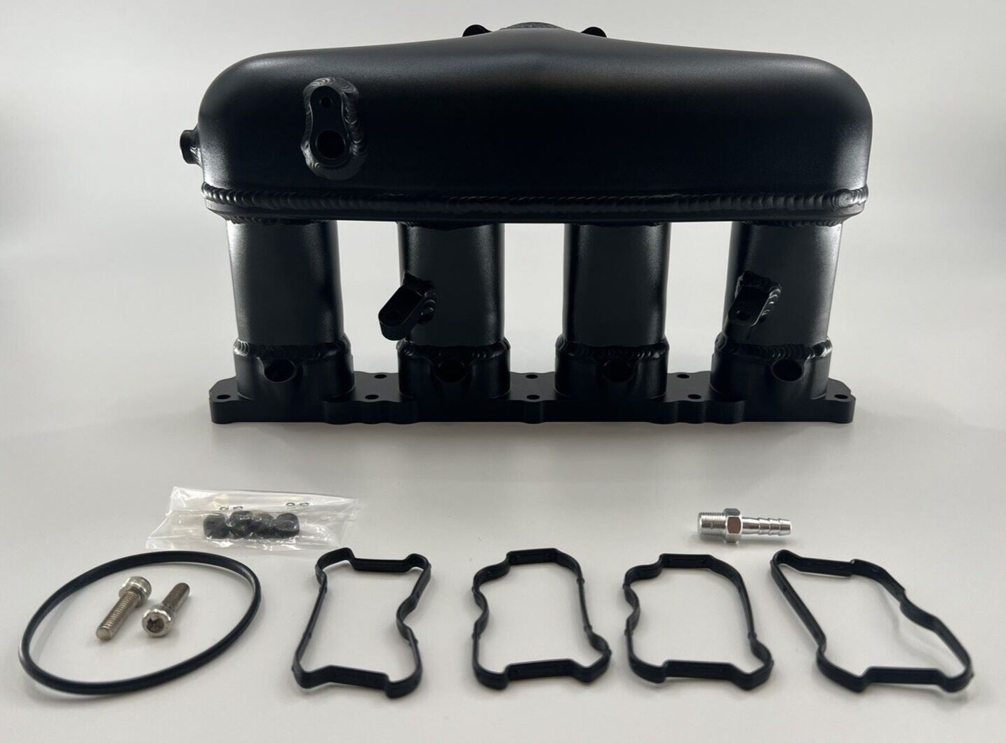 Jack Spania Racing intake manifold for VW Audi EA888 Gen 3 1.8T 2.0T engine, shown in the image.