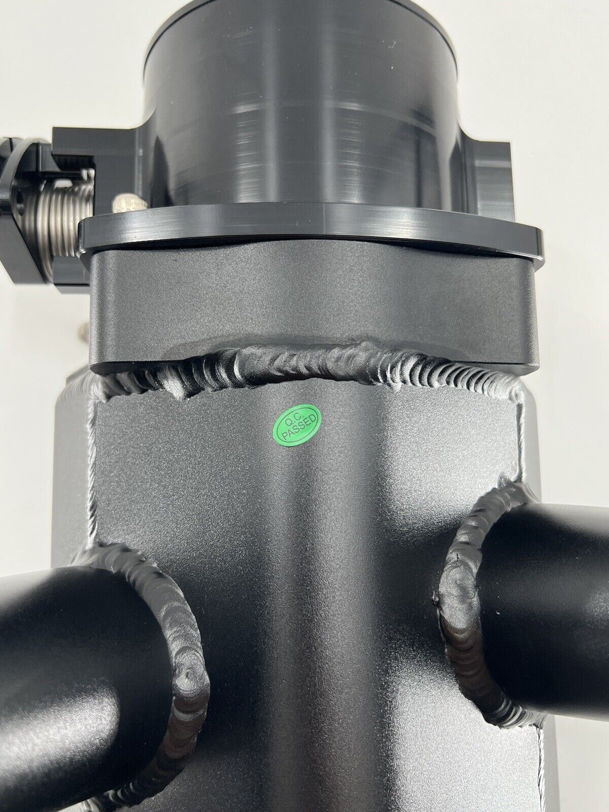 GM Chevrolet LS fabricated intake manifold and throttle body for LS3 L92 engines, by Jack Spania Racing, shown in the image.