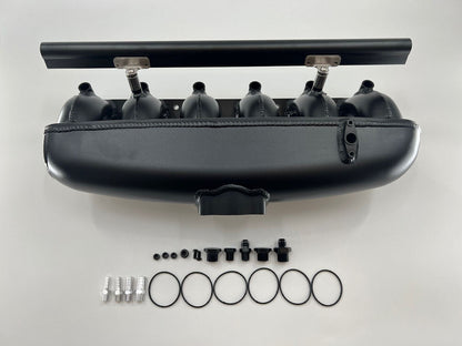 Center feed intake manifold fuel rail for BMW N54 135i, 335i, 535i engine parts by Jack Spania Racing, shown in image.