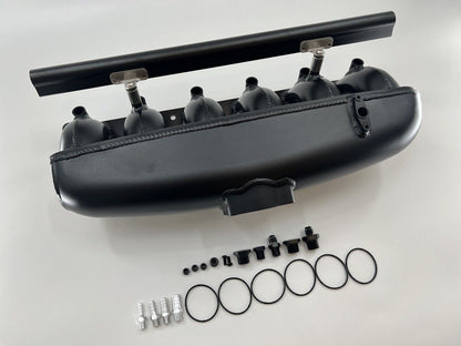 Center feed intake manifold fuel rail for BMW N54 engine, compatible with 135i, 335i, and 535i models, by Jack Spania Racing.