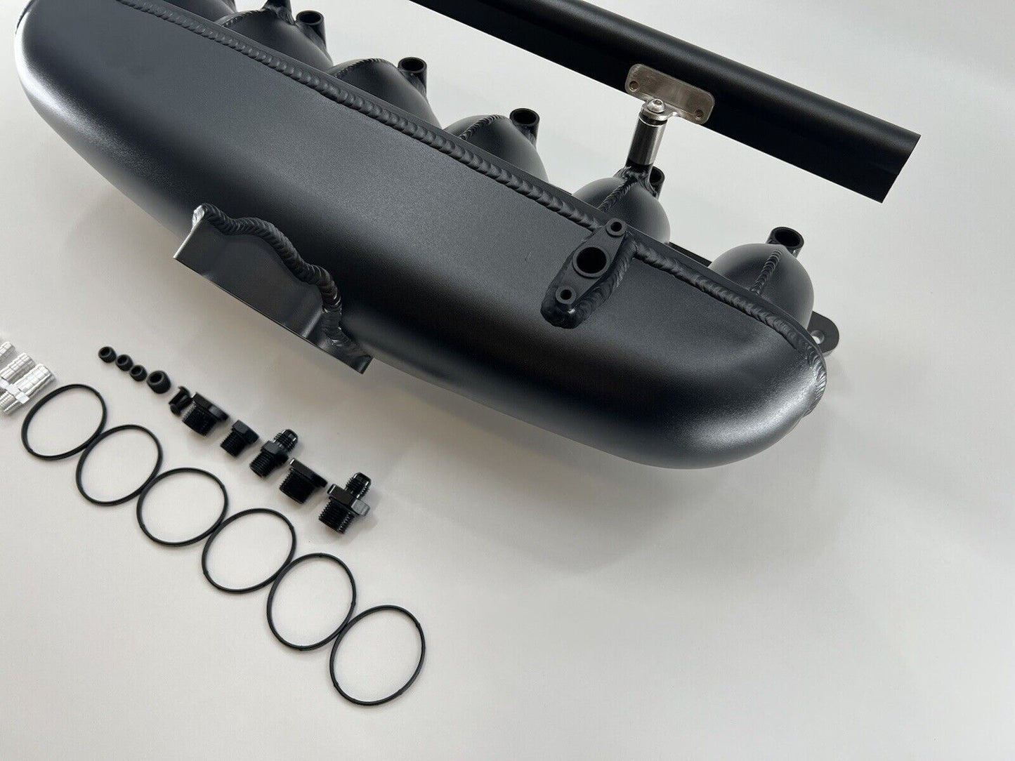 Center feed intake manifold fuel rail for BMW N54 135i 335i 535i E90, made by Jack Spania Racing, engine parts for vehicle performance.