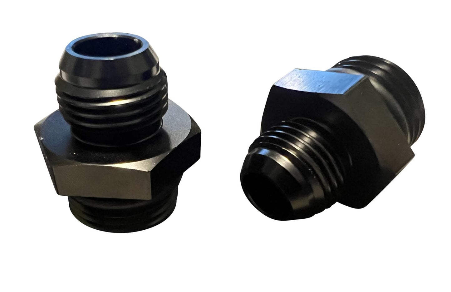 Jack Spania Racing 8AN flare to -10AN ORB male boss fuel pump rail adapter for engine fuel systems.