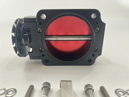 Jack Spania Racing 90mm throttle body with 4-inch hose coupling adapter for engine inlet, automotive performance part.