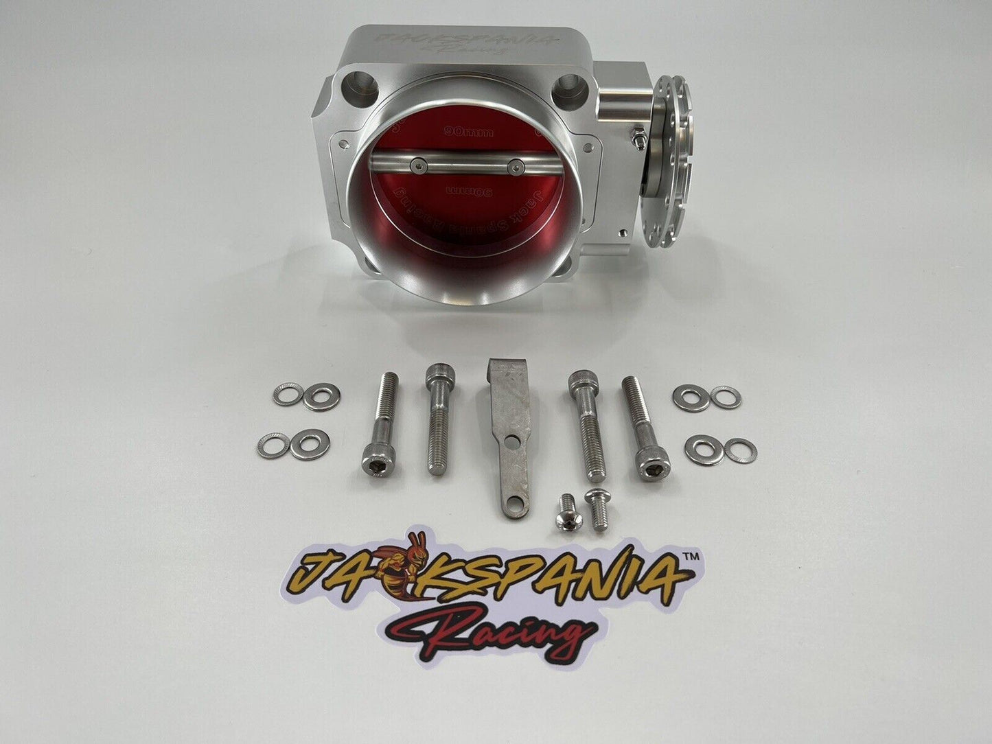 Jack Spania Racing 90mm throttle body with 4-inch hose coupling adapter for engine performance and air intake systems.