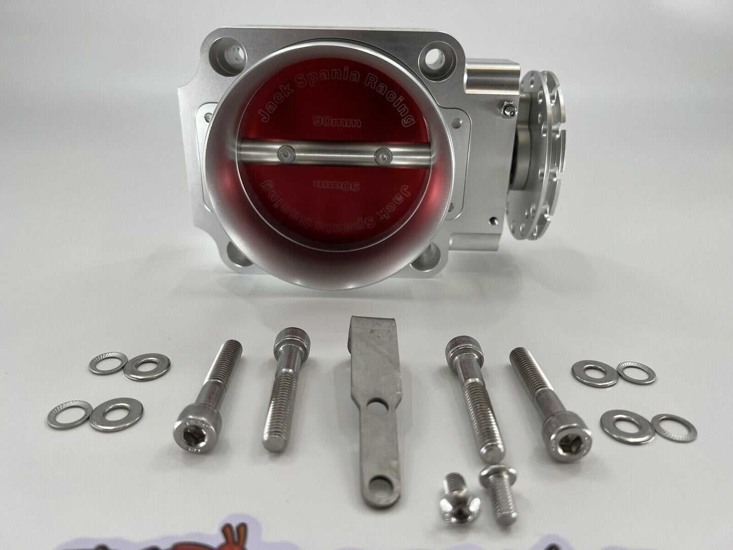 Jack Spania Racing 90mm throttle body with 4-inch hose coupling adapter for engine intake systems.