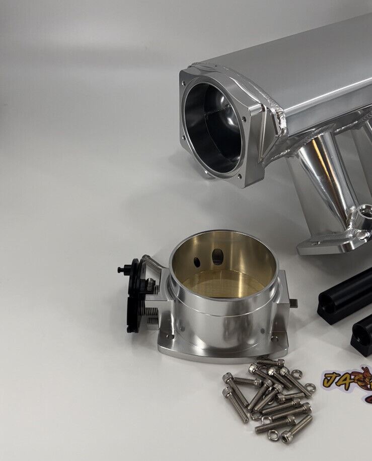 GM Chevrolet LS Fabricated Intake Manifold Throttle Body for LS3 L92 engines, made by Jack Spania Racing, shown on engine part.