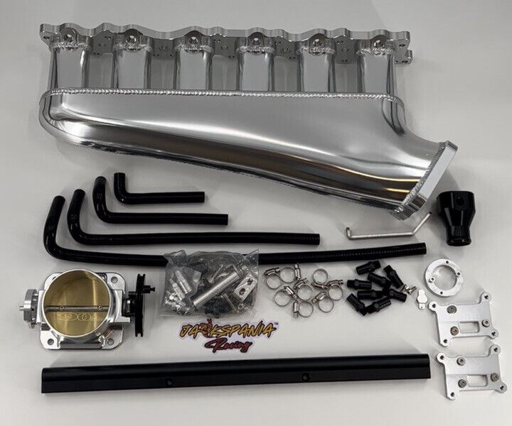 Jack Spania Racing RB25DET intake manifold, fuel rail, and 90mm Skyline throttle body engine parts for RB25 engine upgrade.