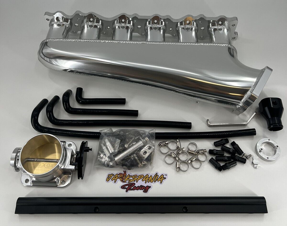 Jack Spania Racing RB25DET intake manifold fuel rail and 90mm throttle body for Nissan Skyline engine upgrade.