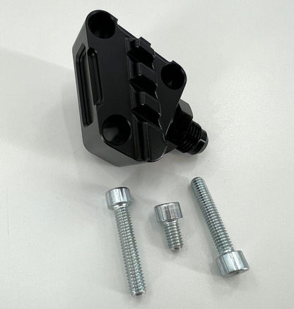 Jack Spania Racing K Series K20 K24 power steering line tuck fitting adapter for engine upgrades, shown in close-up.