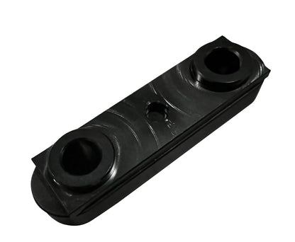 Aluminum Delrin steering rack slider for DC5 EP3 RSX Type S Civic 01-06, by Jack Spania Racing, shown on engine part.