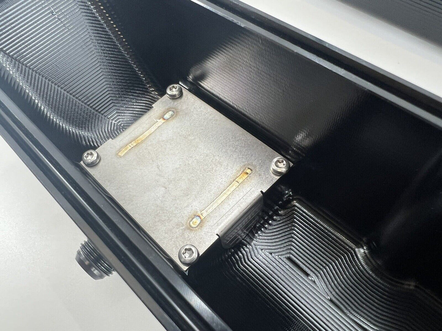 Toyota Supra 2JZ billet valve covers with anodized oil cap bolts from Jack Spania Racing, showcasing engine component details.
