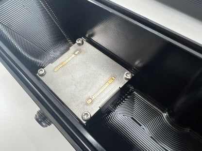 Toyota Supra 2JZ billet valve covers with anodized oil cap bolts from Jack Spania Racing, showcasing engine component details.