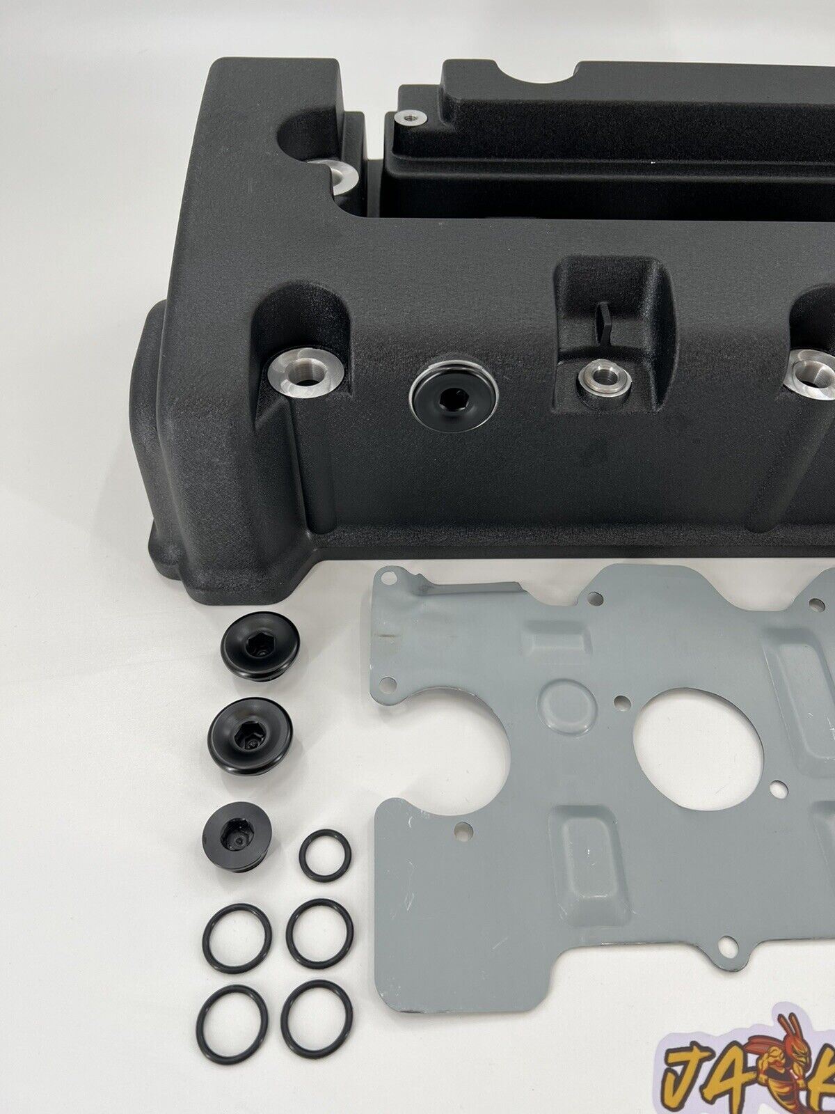Cast aluminum K Series vented valve cover baffle with AN10 fittings for Honda and Acura K20 and K24 engines by Jack Spania Racing.