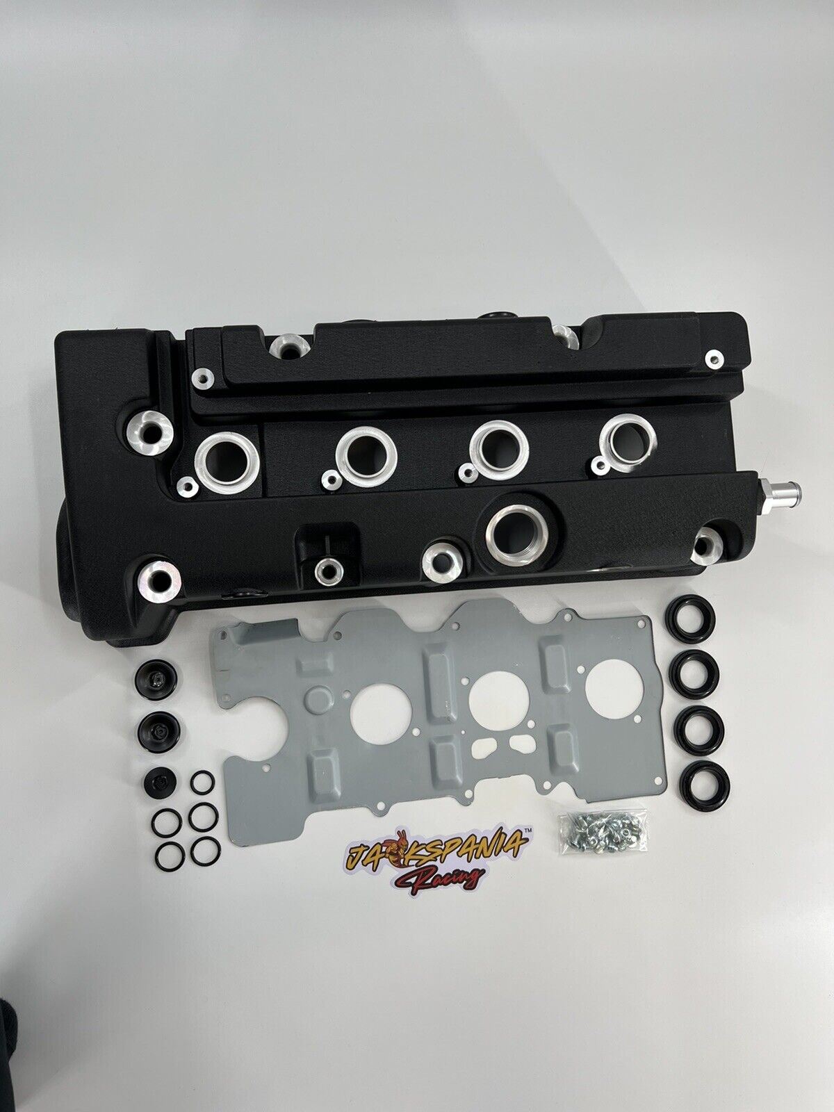 Cast aluminum K Series vented valve cover baffle with AN10 fittings for Honda and Acura K20 and K24 engines, made by Jack Spania Racing.
