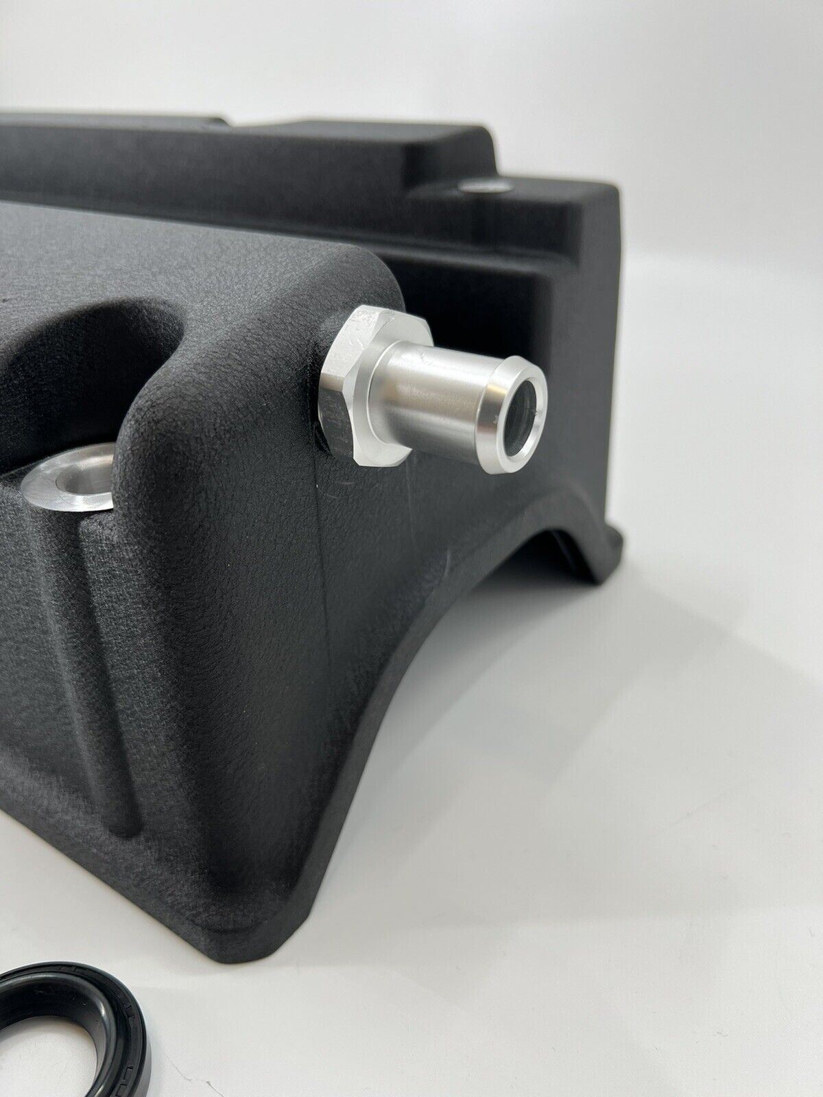 Cast aluminum K Series vented valve cover baffle with AN10 fitting for Honda and Acura K20 and K24 engines, by Jack Spania Racing.