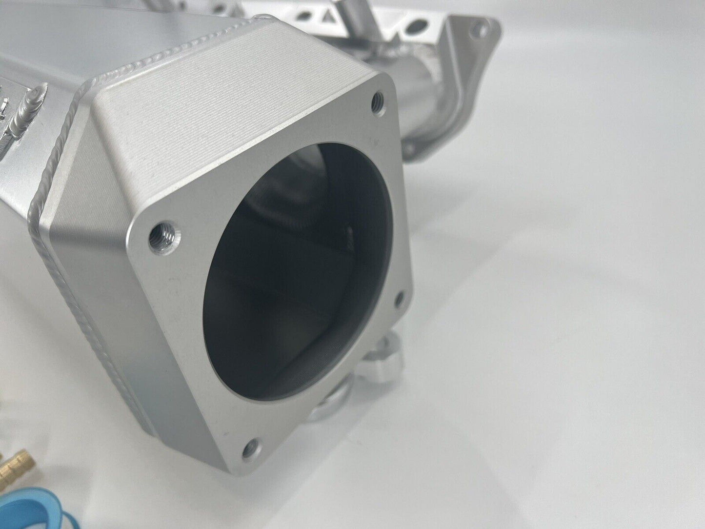 90mm K Series intake manifold by Jack Spania Racing, fits K20 and K24 engines, featuring a side feed plenum for Honda EG, EK, RSX.