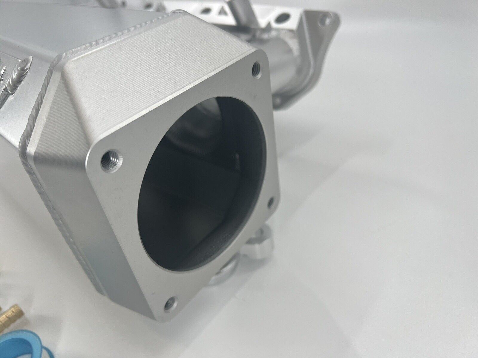 90mm K Series intake manifold by Jack Spania Racing, fits K20 and K24 engines, featuring a side feed plenum for Honda EG, EK, RSX.