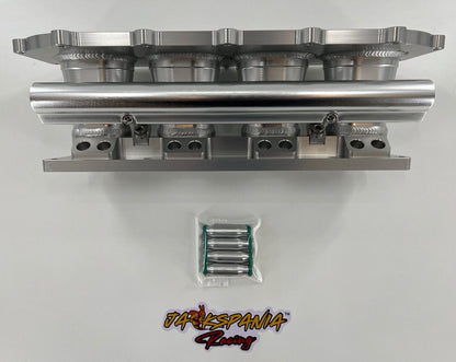Jack Spania Racing billet K series intake manifold adapter for Skunk2 Ultra engine parts, showing the precision-machined metal component.