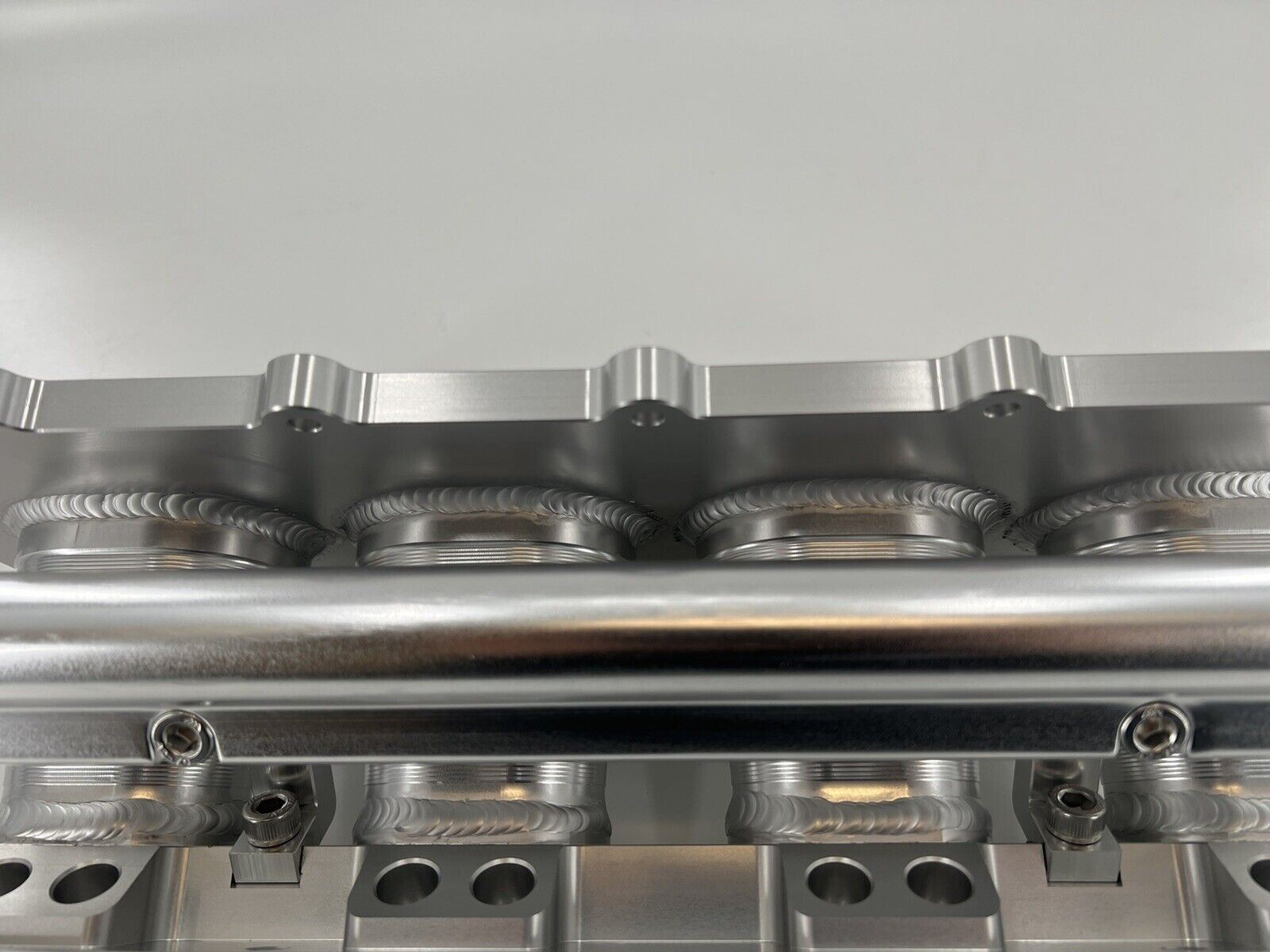 Jack Spania Racing billet K Series intake manifold adapter for Skunk2 Ultra engine parts, shown installed on engine.