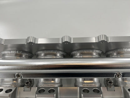 Jack Spania Racing billet K Series intake manifold adapter for Skunk2 Ultra engine parts, shown installed on engine.