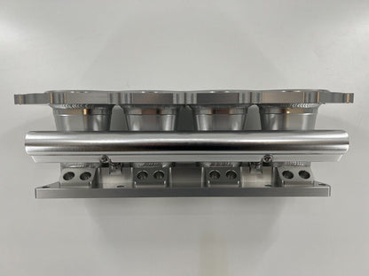 Jack Spania Racing billet K Series intake manifold adapter for Skunk2 Ultra engine parts, machined aluminum with precision fit.