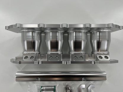 Jack Spania Racing billet B Series intake manifold adapter kit for Skunk2 Ultra Plenum engine parts shown in image.