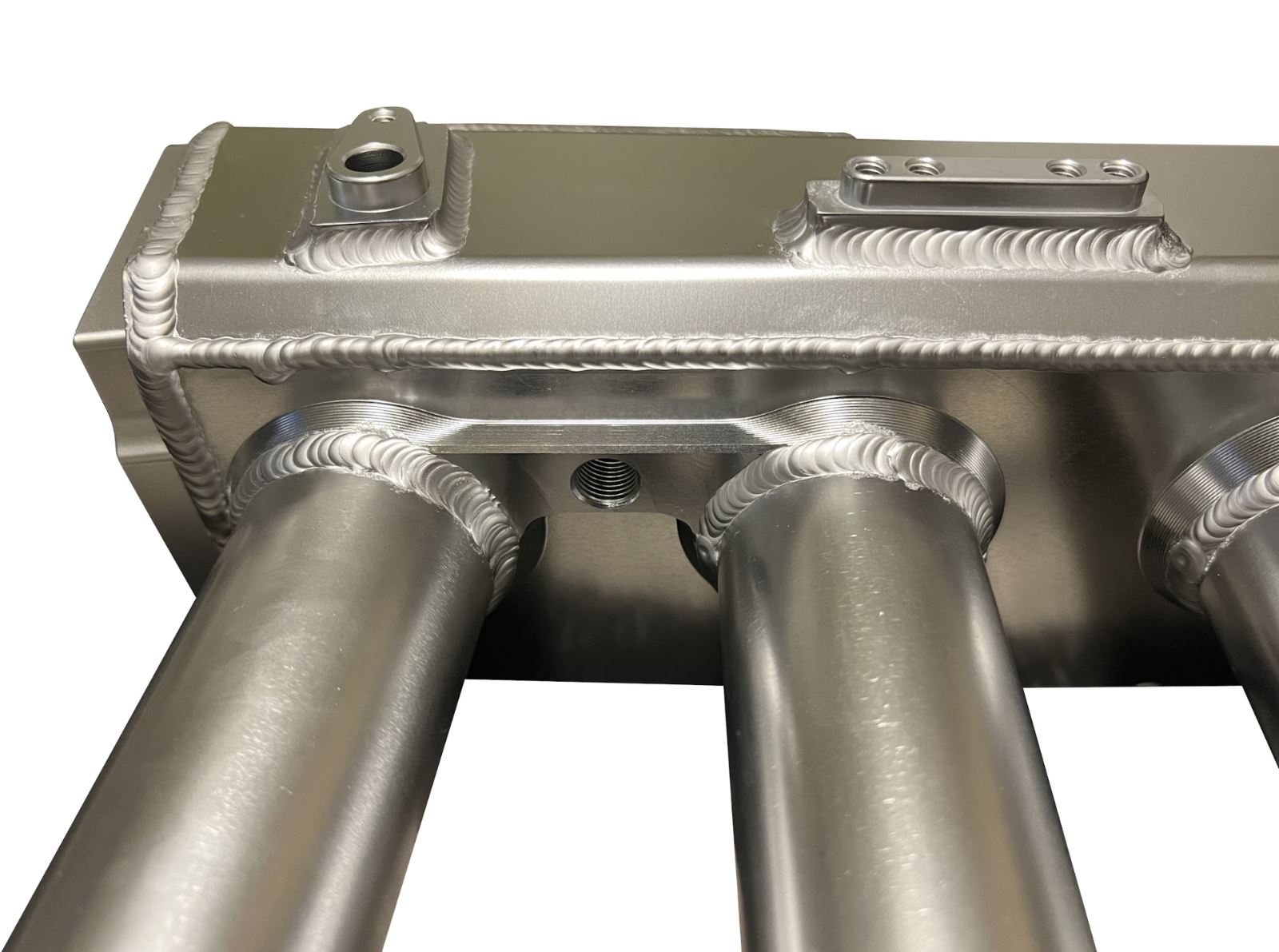 K Series sheet metal intake manifold for K20Z3 and K24 engines by Jack Spania Racing, installed on a vehicle's engine bay.