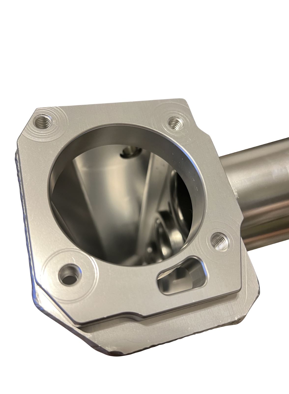 Close-up of Jack Spania Racing K Series sheet metal intake manifold for K20Z3, K24, K Swap engines on an engine bay.