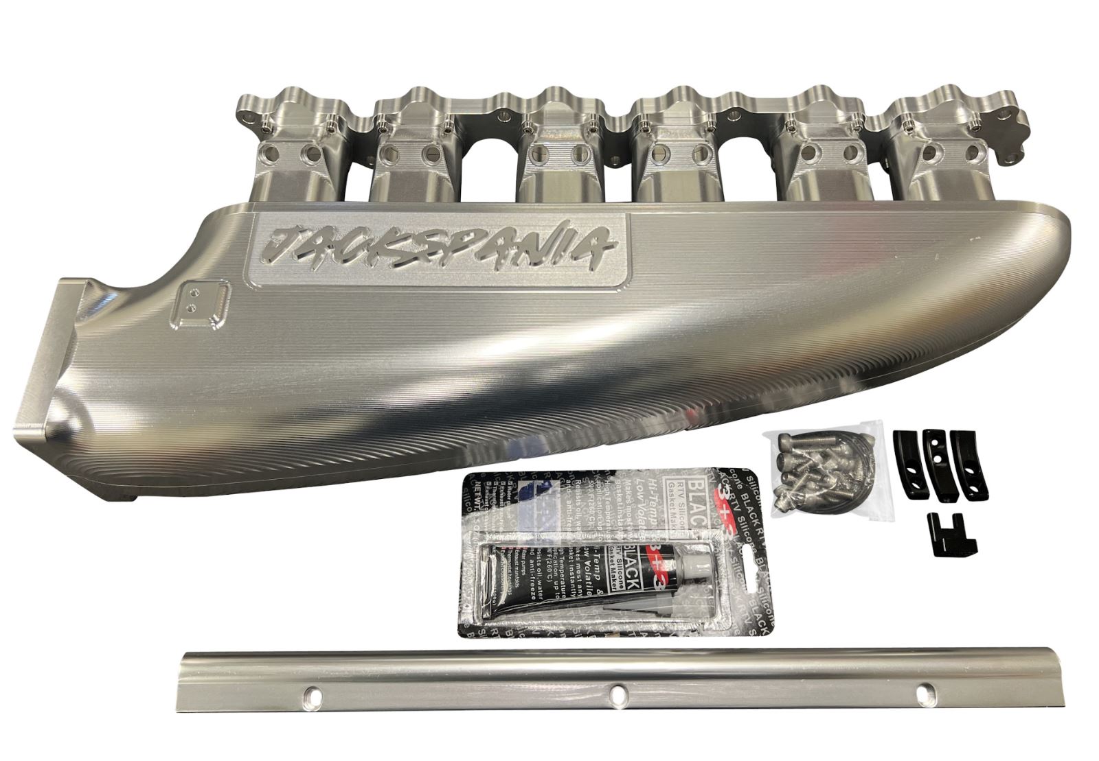 Fully billet 2JZ GTE intake manifold with throttle body and six injectors from Jack Spania Racing for engine performance.
