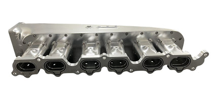 Jack Spania Racing fully billet 2JZ GTE intake manifold with throttle body and six injectors for high-performance engine upgrade.
