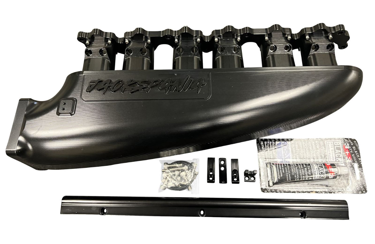 Fully billet 2JZ GTE intake manifold with 12 injector fuel rail and throttle body for high-performance engine tuning.