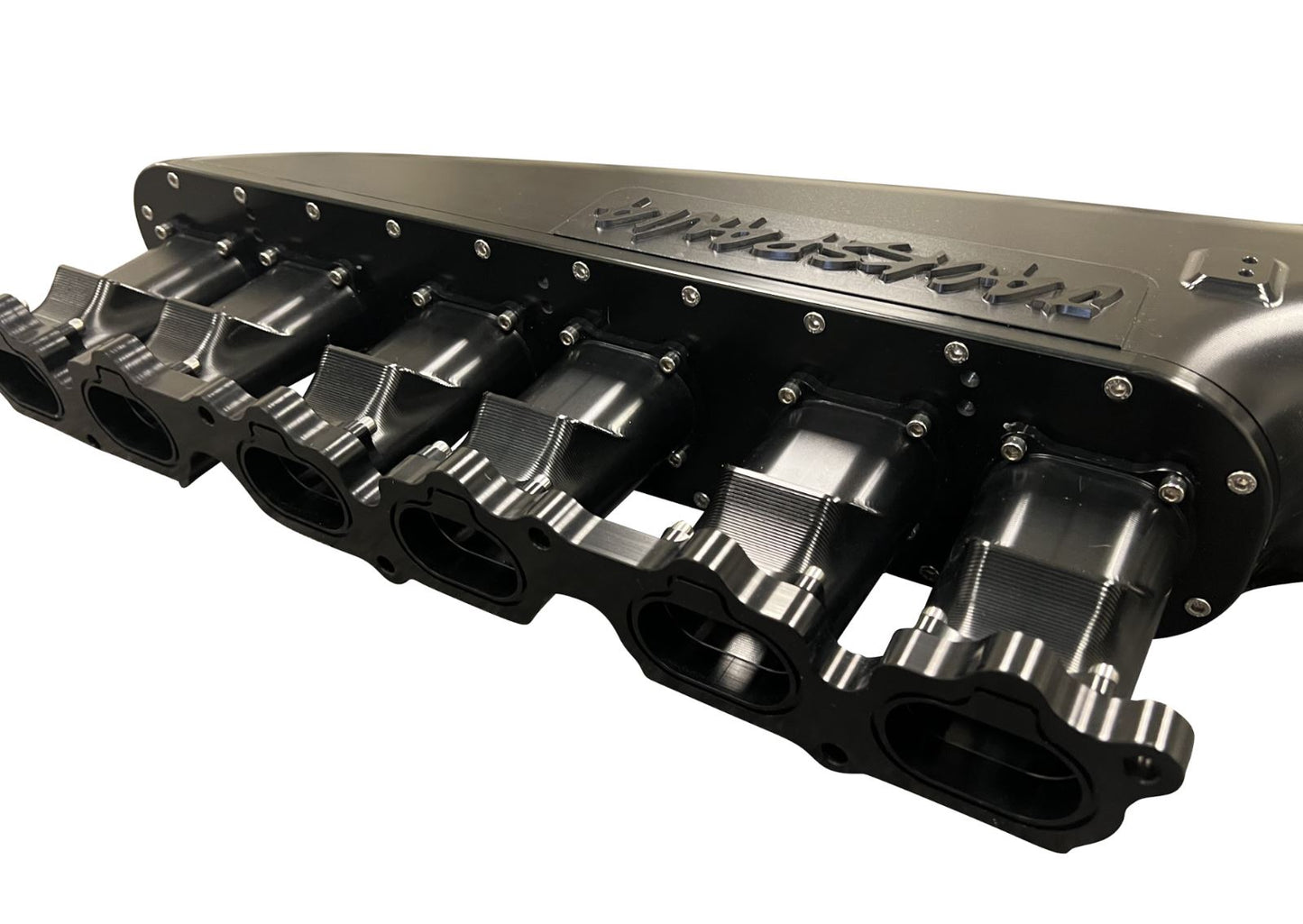 Jack Spania Racing 2JZ GTE intake manifold with 12 injector fuel rail and throttle body for Toyota engine performance.
