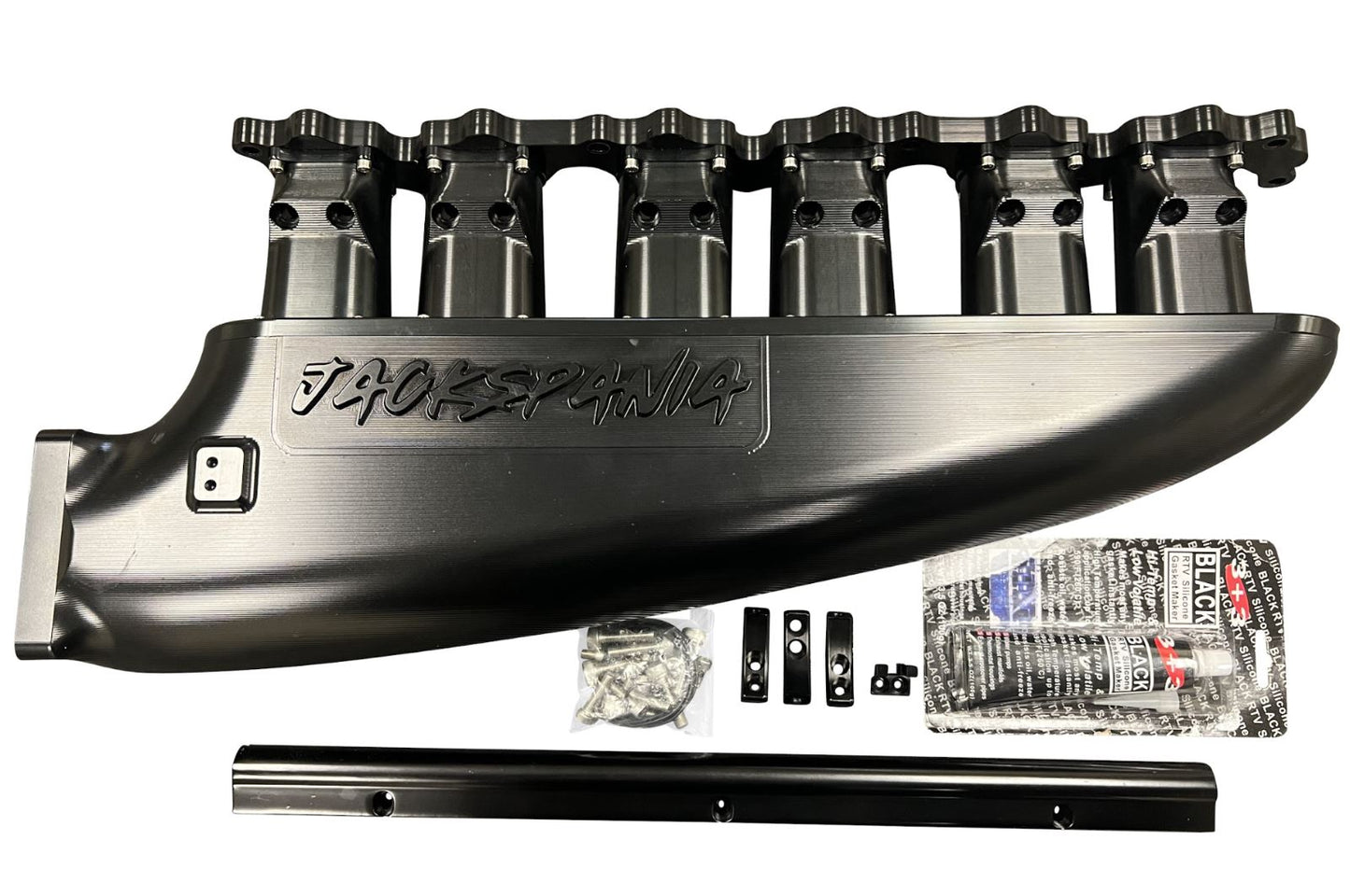 Fully billet 2JZ GTE intake manifold with 12 injector fuel rail and throttle body for engine performance by Jack Spania Racing.