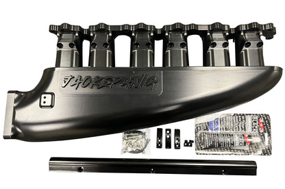 Fully billet 2JZ GTE intake manifold with 12 injector fuel rail and throttle body for engine performance by Jack Spania Racing.