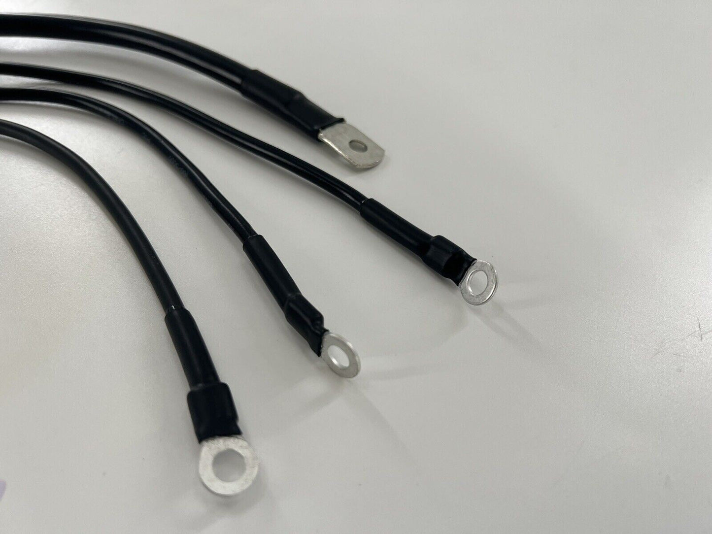 Heavy duty battery ground strap kit for Honda Acura B D H K series engines, by Jack Spania Racing, used for transmission grounding.