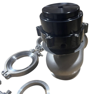 Universal 60mm V-band flange clamp for wastegate EWG, made by JackSpania Racing, shown on engine parts.
