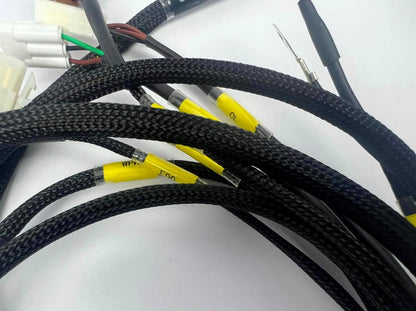 JackSpania Racing front end headlight wire tuck harness for Acura Integra DC and Civic blinkers, engine parts installation.