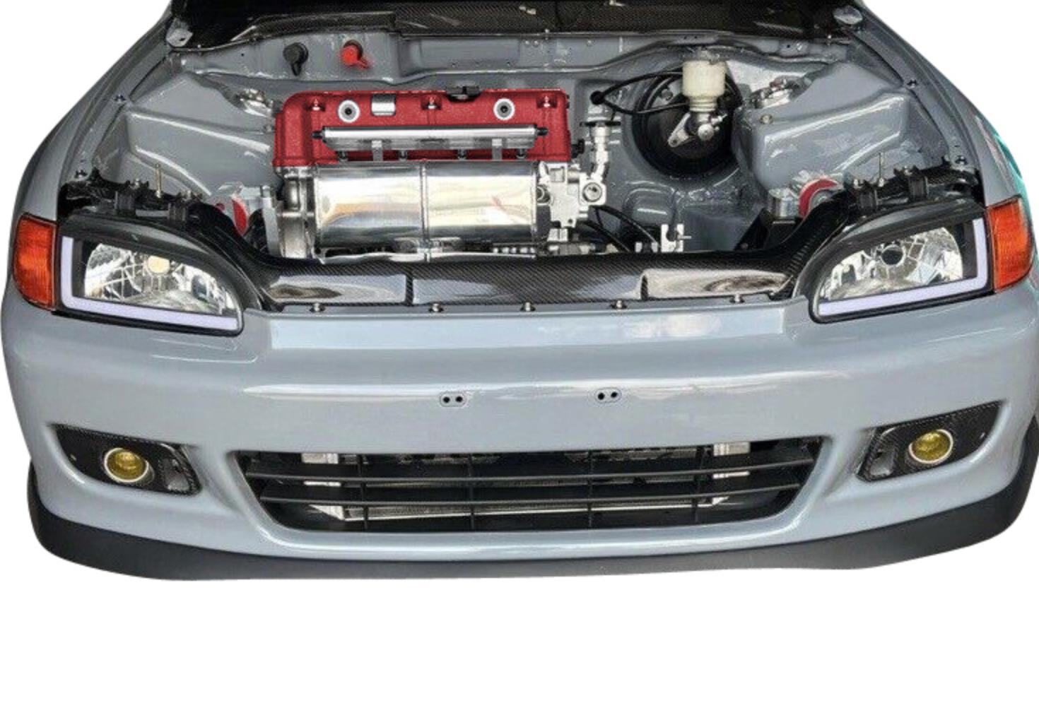 Cast aluminum K Series vented valve cover baffle for Honda Acura K20 K24 engines, with AN10 fittings, by Jack Spania Racing.