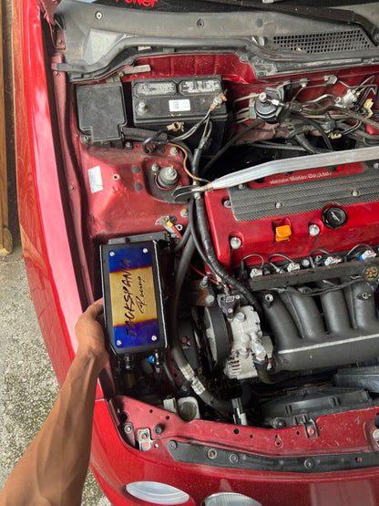 JackSpania Racing K Series K Swap tucked oil catch can installed in Honda Civic EG or Acura Integra with K20 or K24 engine.