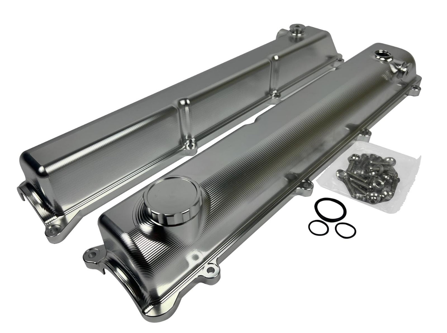 Toyota Supra 2JZ Billet Valve Covers with anodized oil cap bolts, engine parts by JackSpania Racing, showing detailed metal finish.