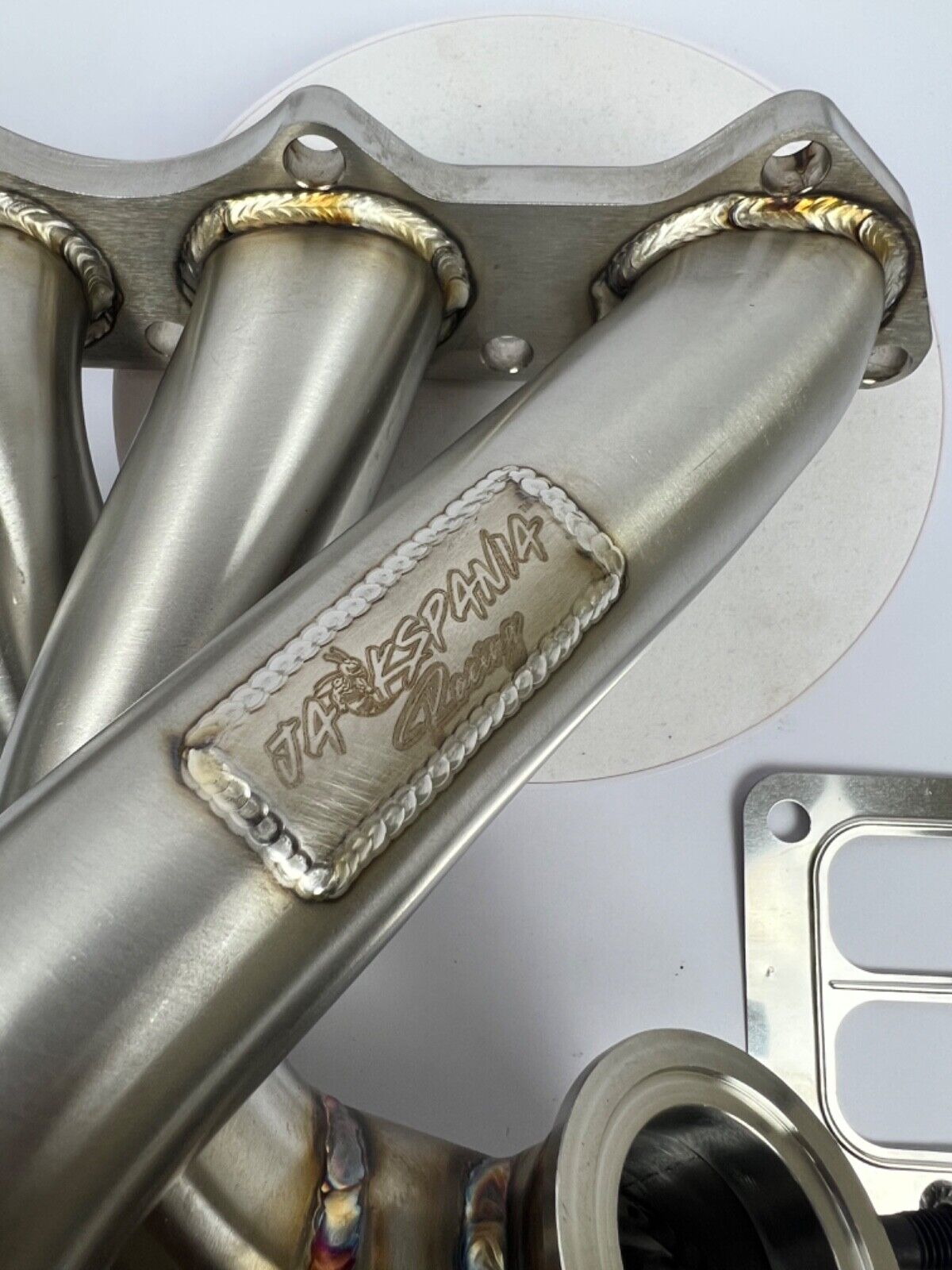 JackSpania Racing B Series forward T4 turbo manifold for B16, B18, B20 engines with 44mm size, front-facing exhaust part.