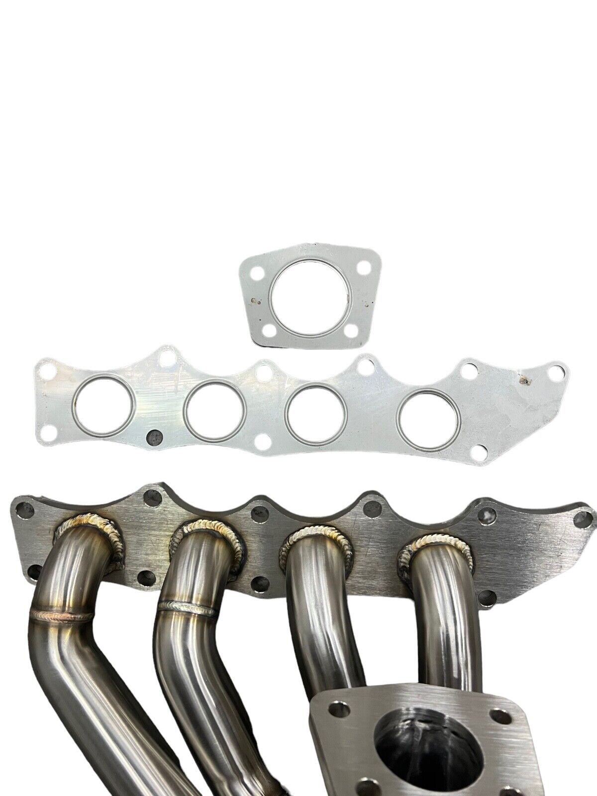 JackSpania Racing tubular turbo manifold for MazdaSpeed 3 6 2.3L DISI MZR, fits OEM size turbos, exhaust replacement part.